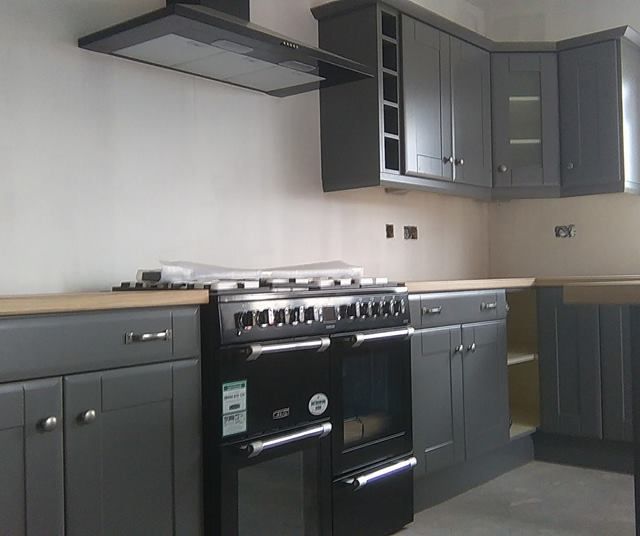 grey wood kitchen installation